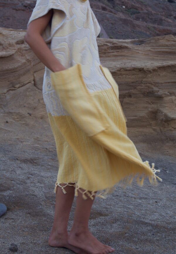 le soleil towel poncho bottom part side view in movement